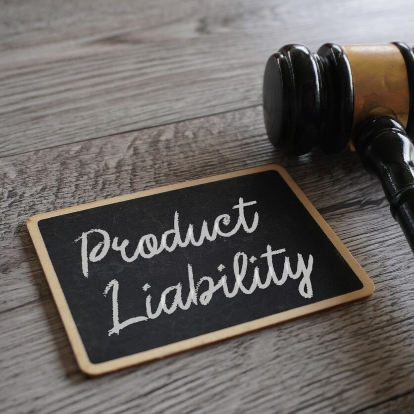 Closeup image of judge gavel and text PRODUCT LIABILITY