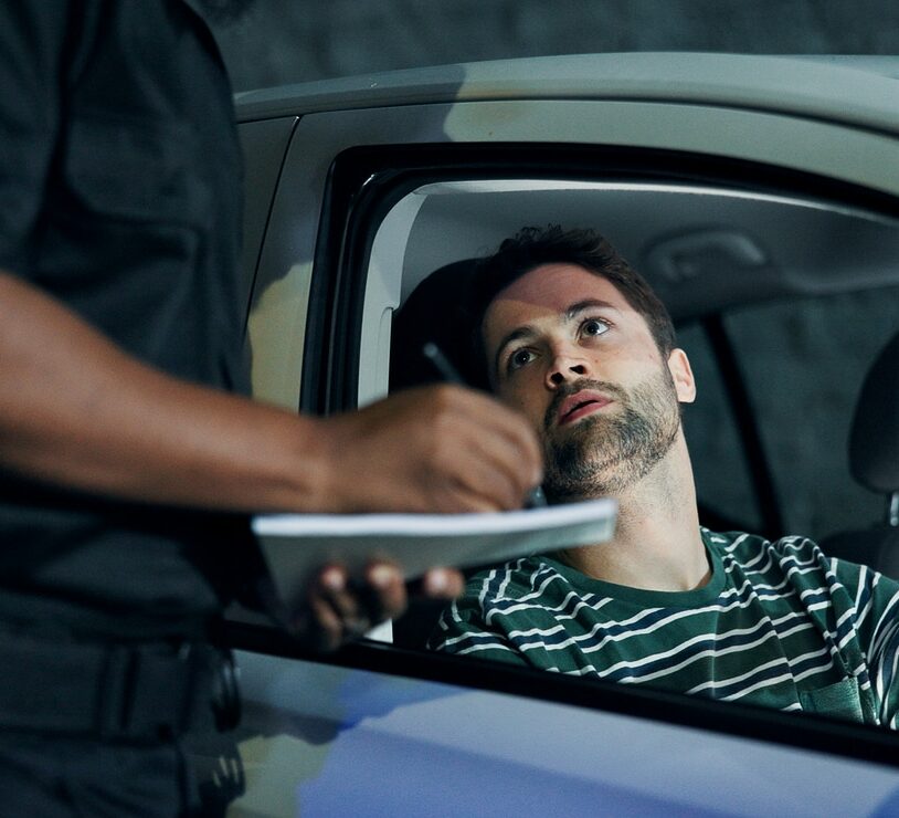 Police officer writing a ticket