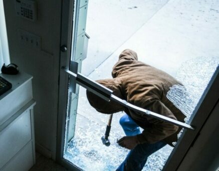 Robber using a sledgehammer,